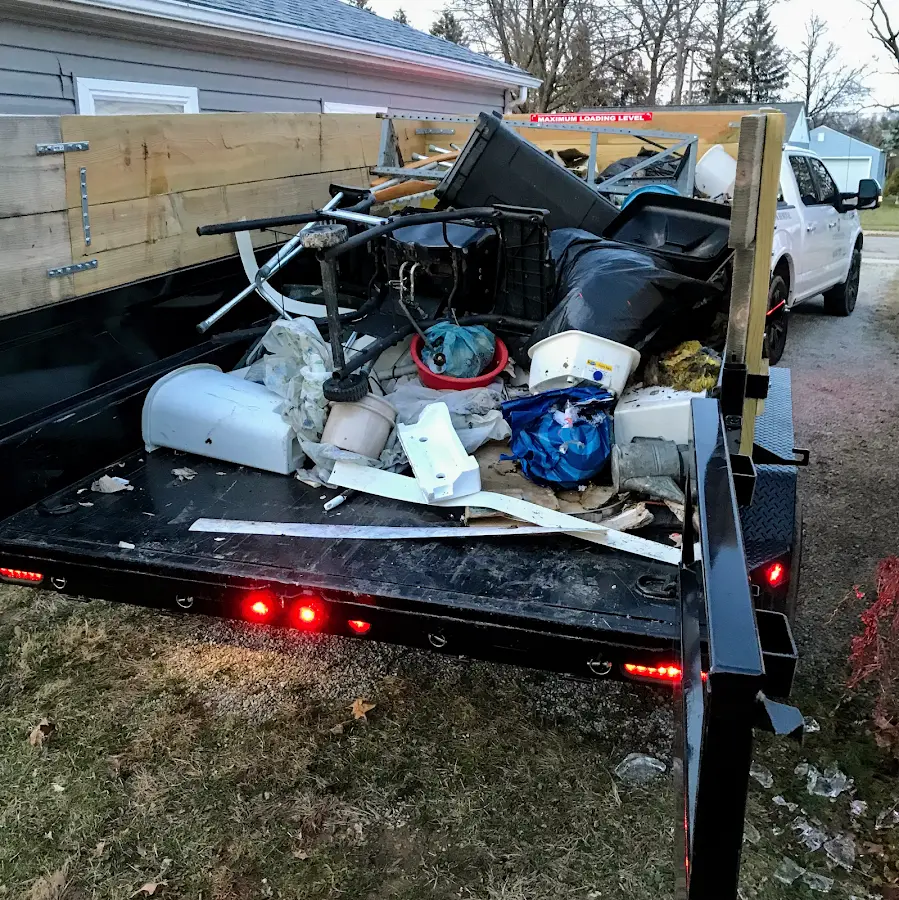Roll-off dumpster delivered to a residential driveway in Mapleton
