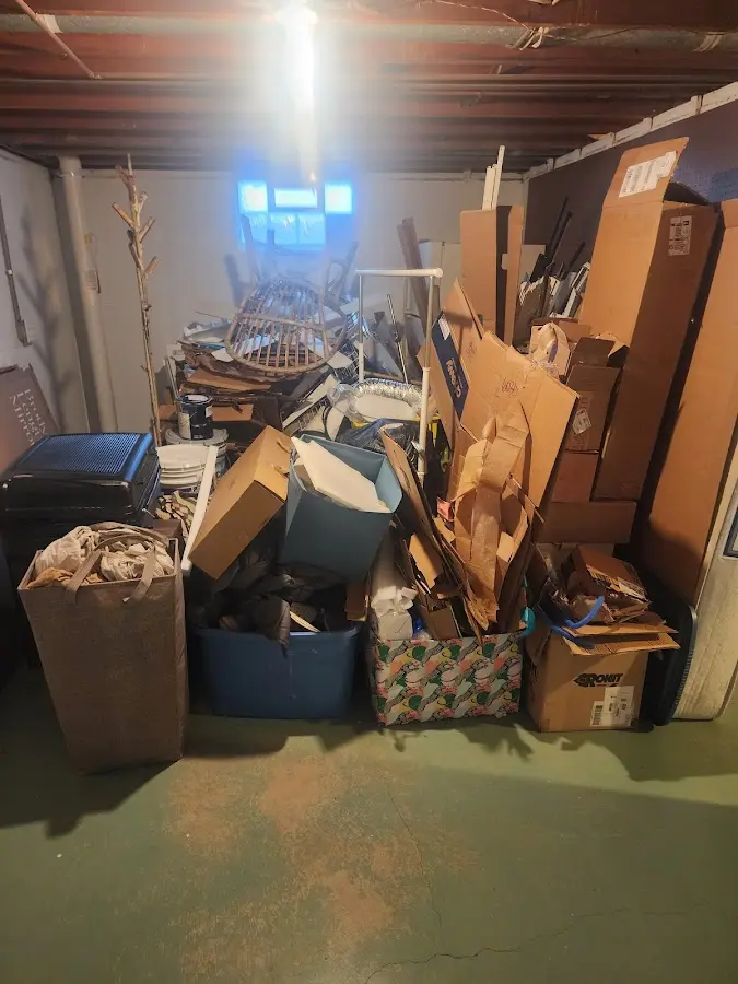 Roll-off dumpster container at job site for Roll Off Dumpster Rental in Mapleton